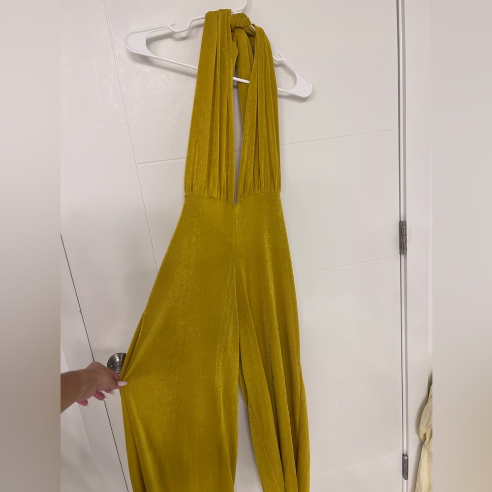 Gold or lemon green romper. Halter top. Straps can be tied in multiple ways
